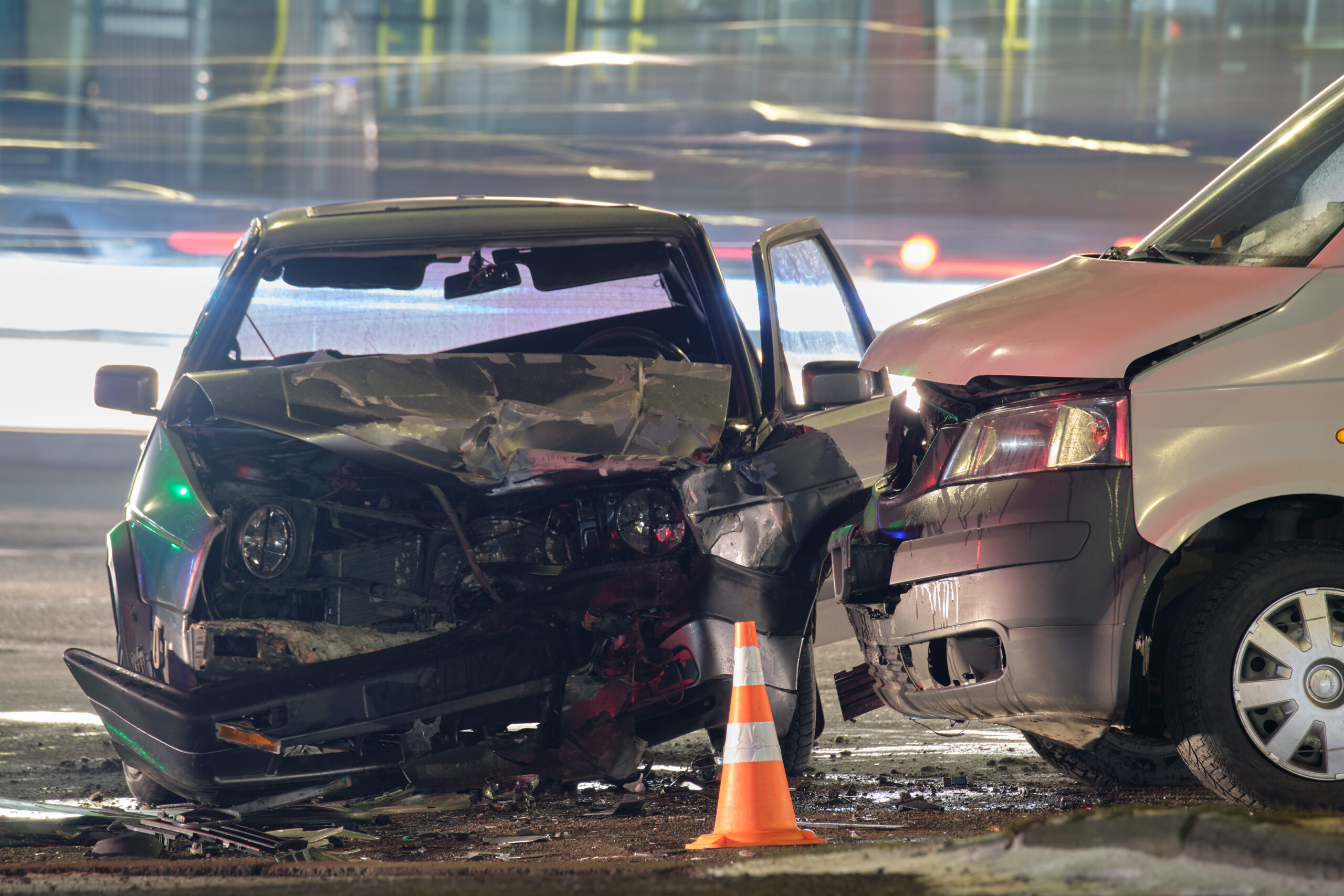 Damaged vehicles after collision illustrating aftermath of a car accident and related trauma.